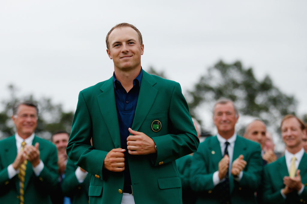 Jordan Spieth poses with the green jacket after winning the 2015 Masters Tournament at Augusta National Golf Club. (Photo by Ezra Shaw/Getty Images)