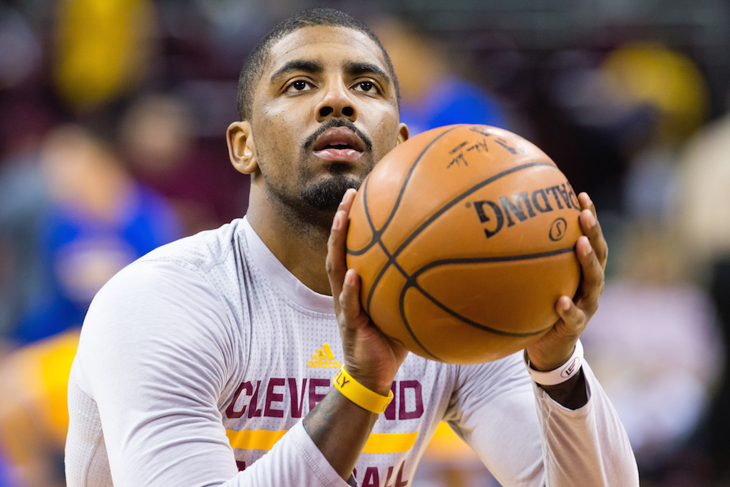 Kyrie Irving of the Cleveland Cavaliers warms up prior to the game.