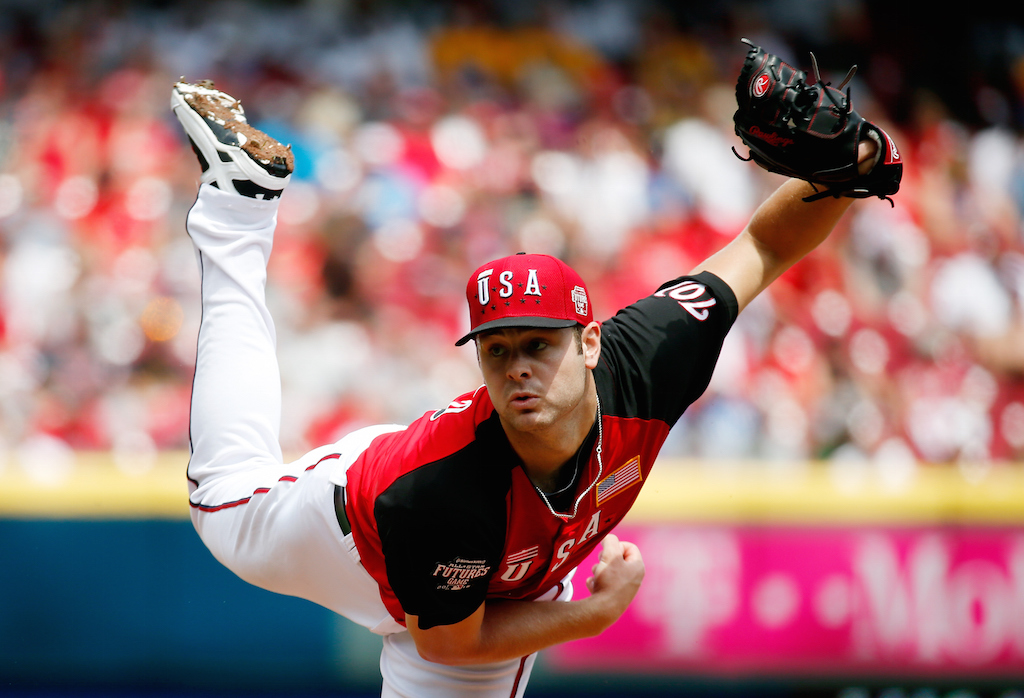 Lucas Giolito of the U.S. Team throws a pitch against the World Team during the 2015 SiriusXM All-Star Futures Game
