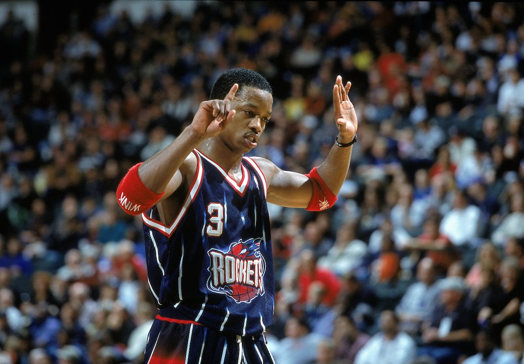 Houston's Steve Francis signals on the court.