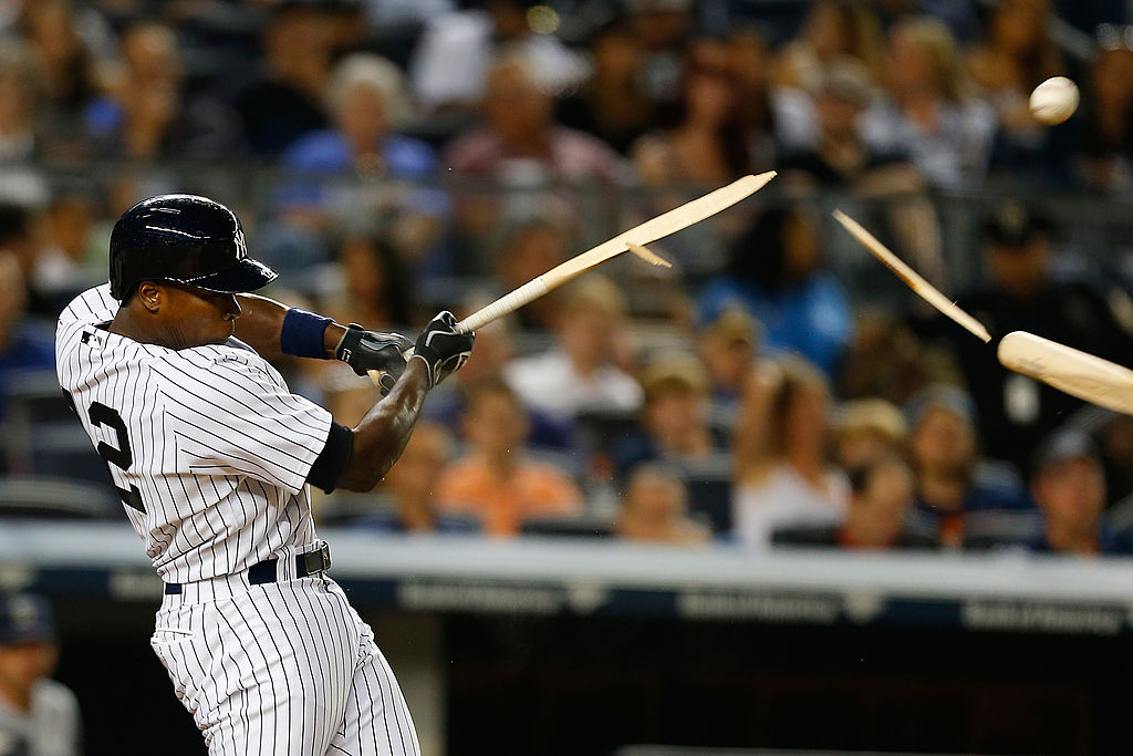 Alfonso Soriano of the New York Yankees breaks his bat fouling the ball off in the sixth inning against the Seattle Mariners at Yankee Stadium on June 2, 2014 in the Bronx borough of New York City.