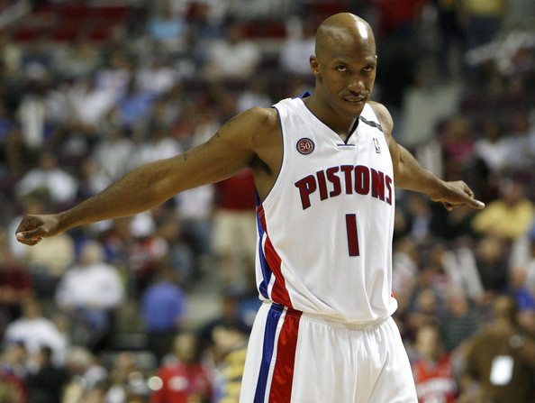Chauncey Billups stretching his arms out during a game.