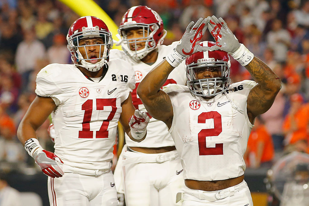 Derrick Henry of the Alabama Crimson Tide celebrates with teammate Kenyan Drake after scoring a 50-yard touchdown against the Clemson Tigers during the 2016 College Football Playoff National Championship Game at University of Phoenix Stadium on January 11, 2016 in Glendale, Arizona. (Photo by Kevin C. Cox/Getty Images)