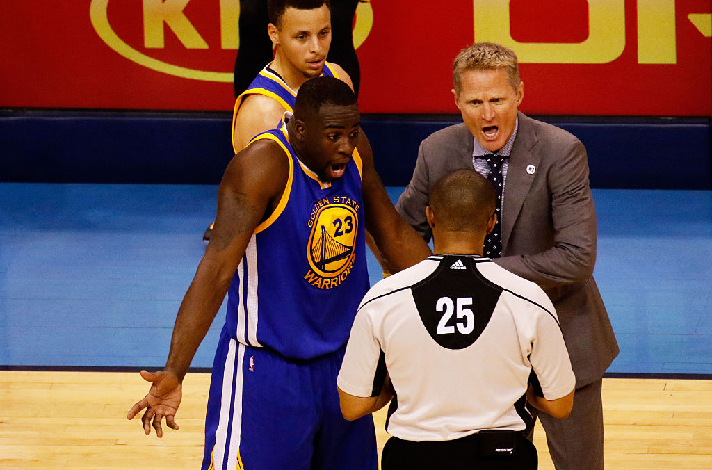 with referee Tony Brothers in the second quarter against the Oklahoma City Thunder in Game Three of the Western Conference Finals during the 2016 NBA Playoffs