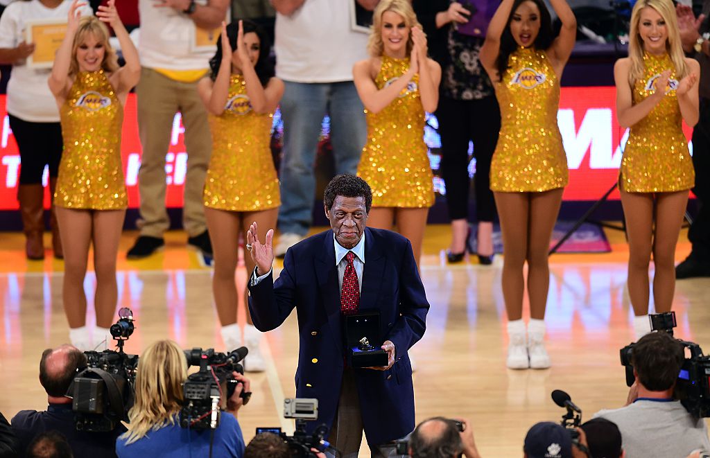 NBA legend and former Laker Elgin Baylor acknowledges the crowd during a Los Angeles Lakers game.