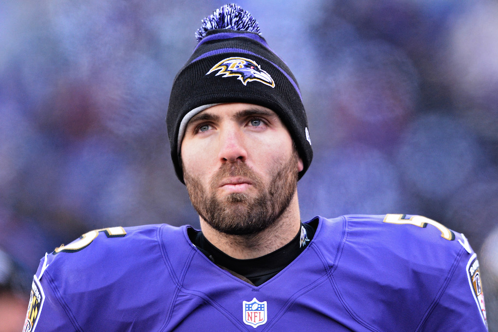 BALTIMORE, MD - NOVEMBER 24: Quarterback Joe Flacco #5 of the Baltimore Ravens looks on after throwing an interception against the New York Jets in the second quarter at M&T Bank Stadium on November 24, 2013 in Baltimore, Maryland. 
