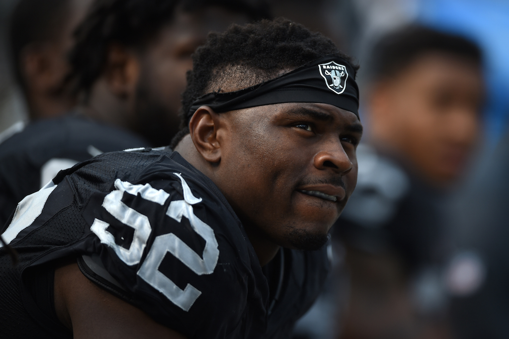The Oakland Raiders' Khalil Mack looks on from the sidelines