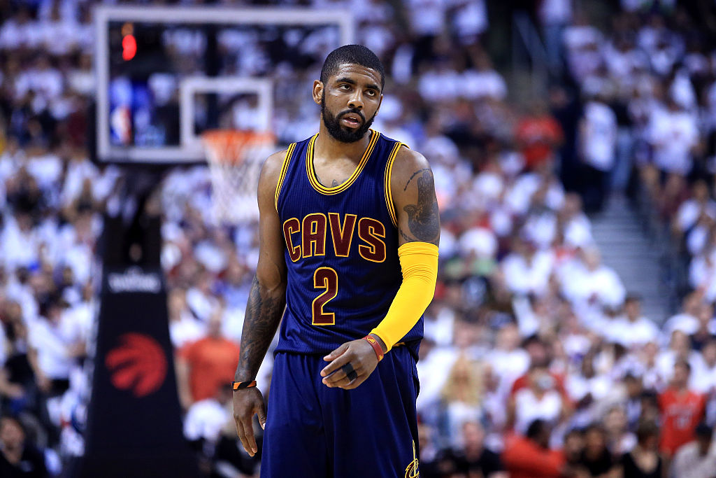 Kyrie Irving #2 of the Cleveland Cavaliers looks discouraged.