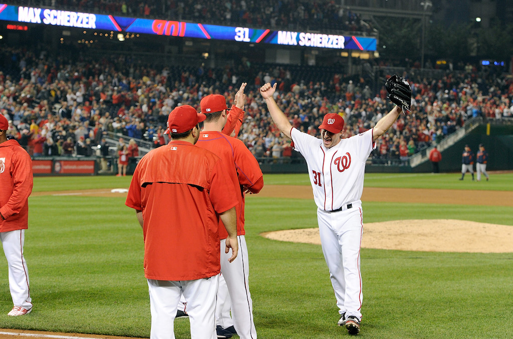 Max Scherzer is congratulated by teammates after his 20-strikeout game.