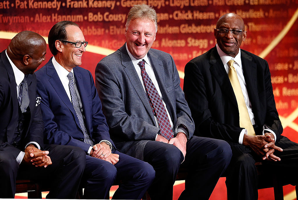 David Stern (not pictured), inductee, speaks while presenters Larry Bird, Earvin 'Magic' Johnson, Bob Lanier, and NBA contributor Russ Granik listen during the 2014 Basketball Hall of Fame Enshrinement Ceremony at Symphony Hall on August 8, 2014 in Springfield, Massachusetts. (Photo by Jim Rogash/Getty Images)