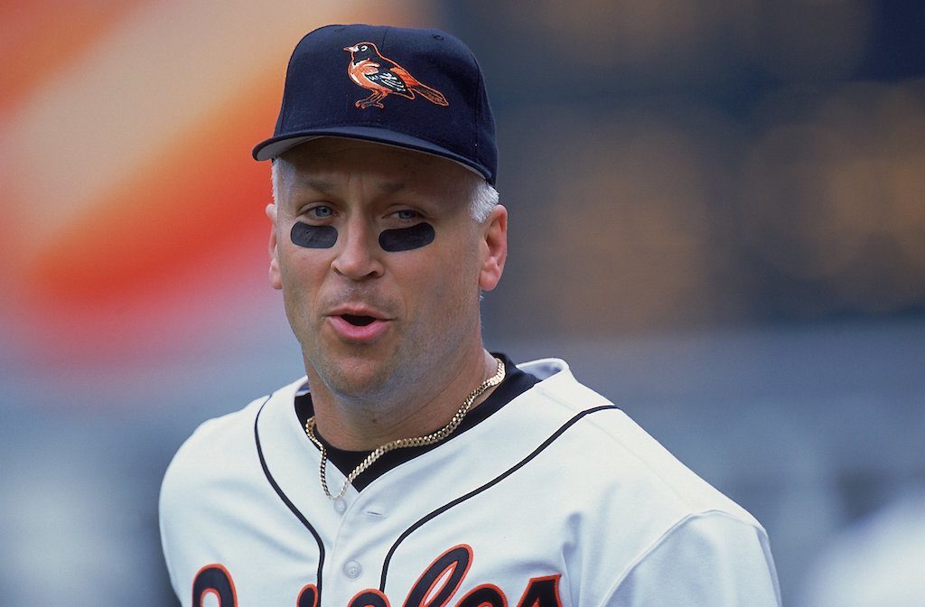 Cal Ripken Jr. #8 of the Baltimore Orioles walks out to the field during the game against the Texas Rangers at the Oriole Park 
