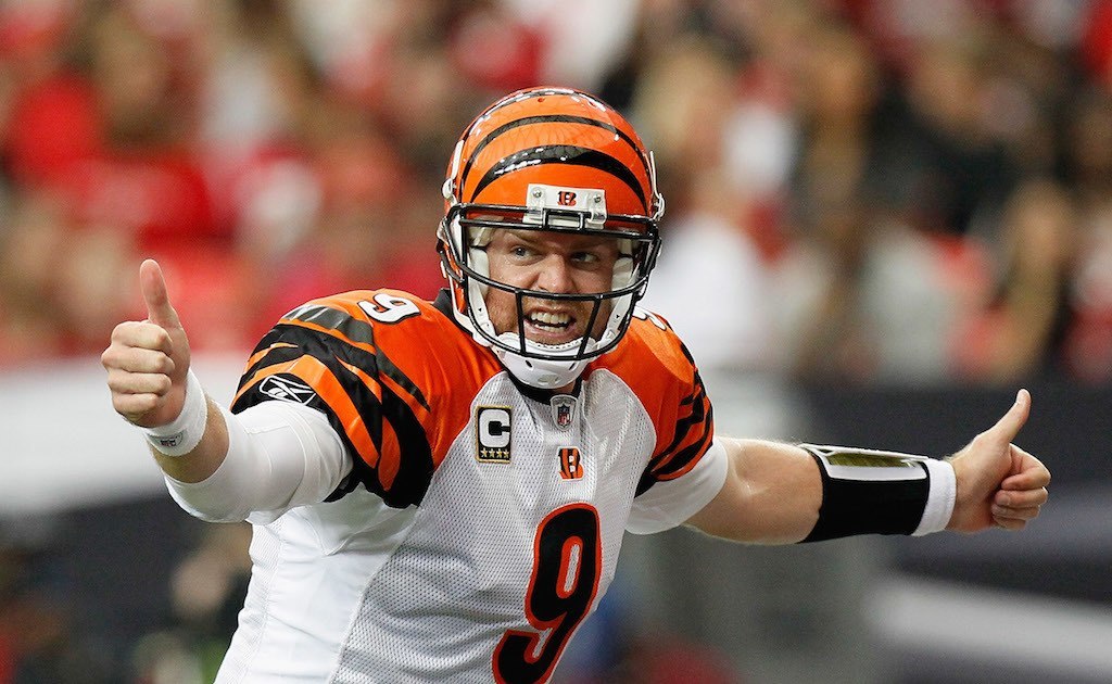 Carson Palmer signals a play.