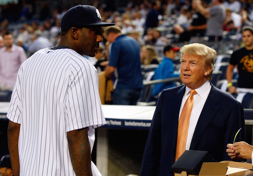 Donald Trump (R) chats with Amar'e Stoudemire before the start of a Yankees game.