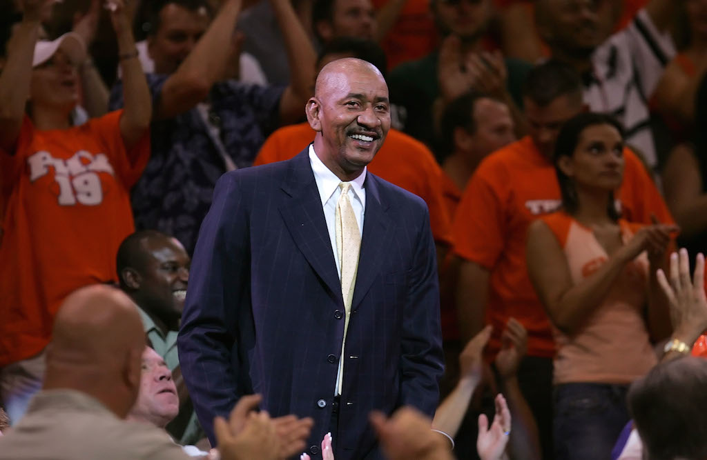George Gervin enjoys a playoff game. | Ronald Martinez-Getty Images