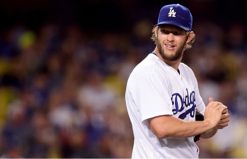 Clayton Kershaw #22 of the Los Angeles Dodgers reacts to his wild pitch.