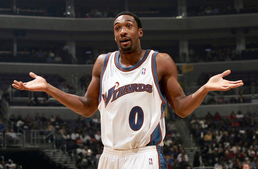 Gilbert Arenas looks at the ref and argues a call.