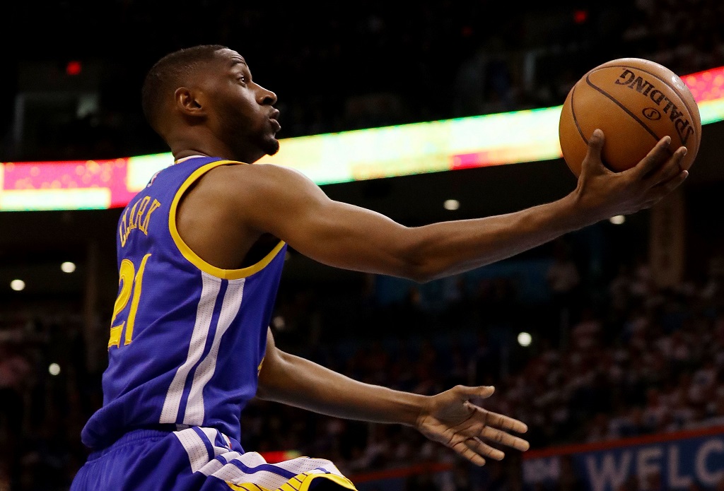 The Golden State Warriors' Ian Clark goes in for the layup.