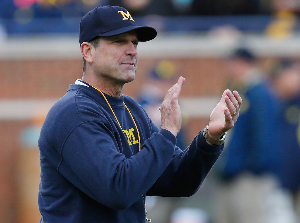 Head coach Jim Harbaugh of the Michigan Wolverines looks on prior to a game.