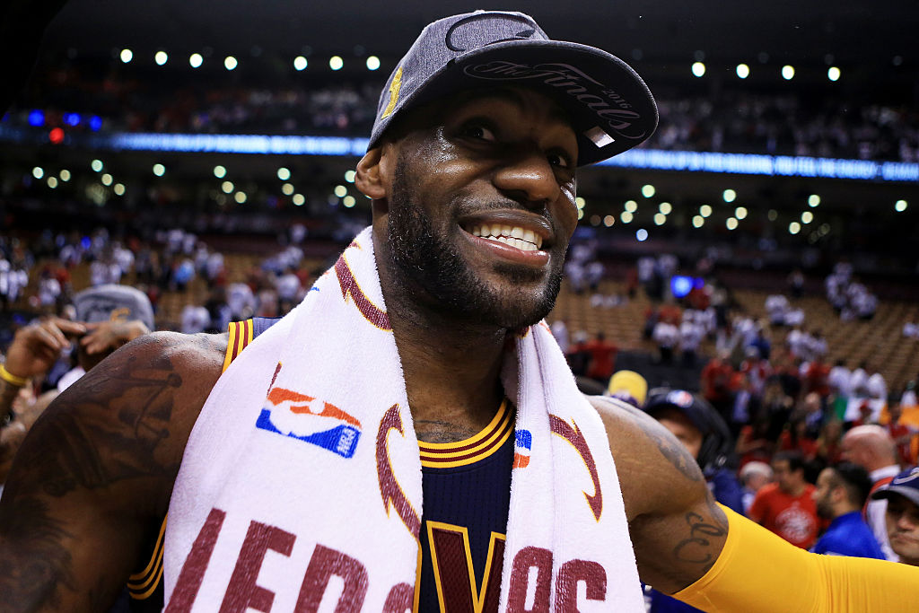 TORONTO, ON - MAY 27: LeBron James #23 of the Cleveland Cavaliers celebrates their 113 to 87 win over the Toronto Raptors in game six of the Eastern Conference Finals during the 2016 NBA Playoffs at Air Canada Centre on May 27, 2016 in Toronto, Canada. NOTE TO USER: User expressly acknowledges and agrees that, by downloading and or using this photograph, User is consenting to the terms and conditions of the Getty Images License Agreement. (Photo by Vaughn Ridley/Getty Images)