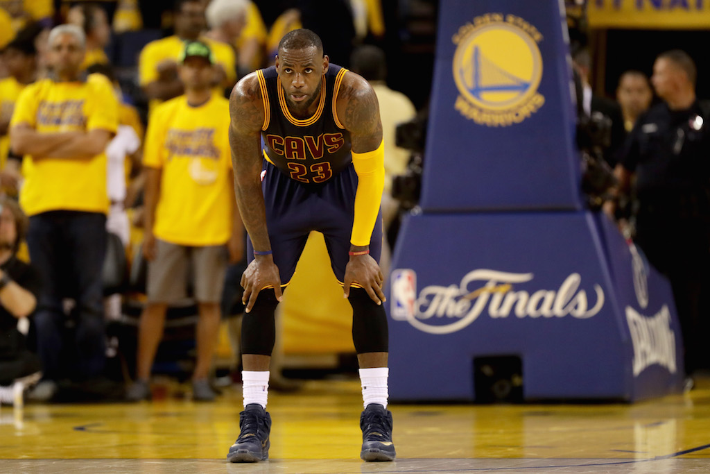 LeBron James looks on during Game 2 of the 2016 NBA Finals. | Ezra Shaw/Getty Images