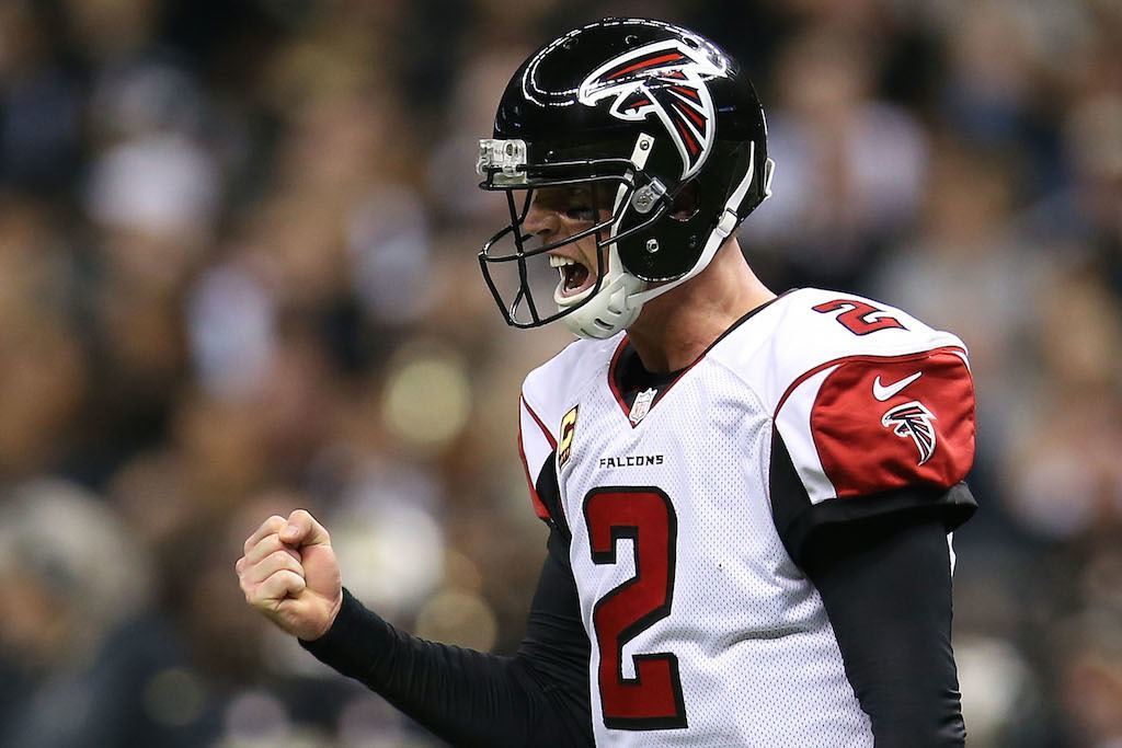 Matt Ryan pumps his fist after throwing a touchdown pass.