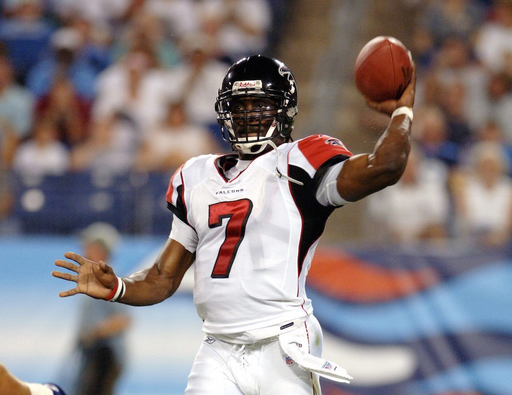 Michael Vick looks for a target in the backfield.