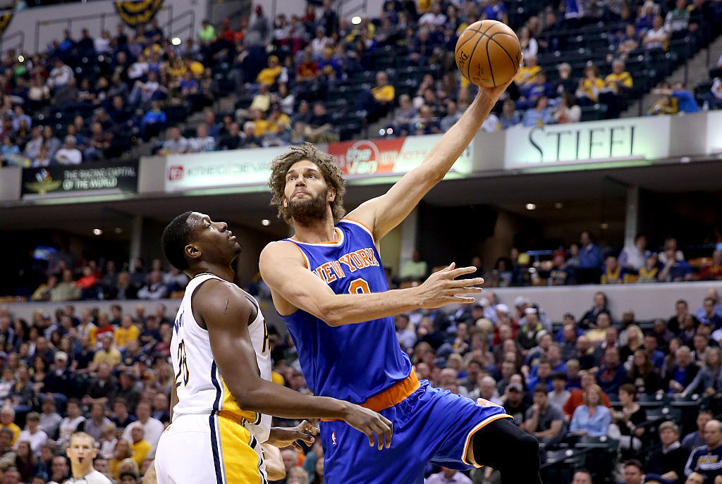 Robin Lopez #8 of the New York Knicks shoots the ball during the game against the Indiana Pacers at Bankers Life Fieldhouse on April 12, 2016 in Indianapolis, Indiana. NOTE TO USER: User expressly acknowledges and agrees that, by downloading and or using this photograph, User is consenting to the terms and conditions of the Getty Images License Agreement. (Photo by Andy Lyons/Getty Images)