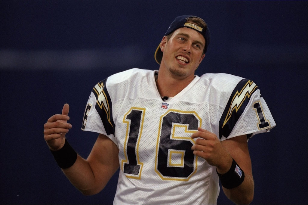 Quarterback Ryan Leaf of the San Diego Chargers stands around talking before a preseason game. | Jamie Squire/Getty Images