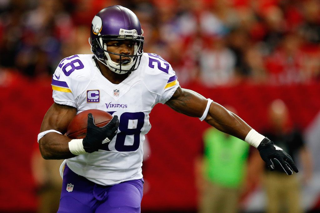 Adrian Peterson playing as running back for the Vikings