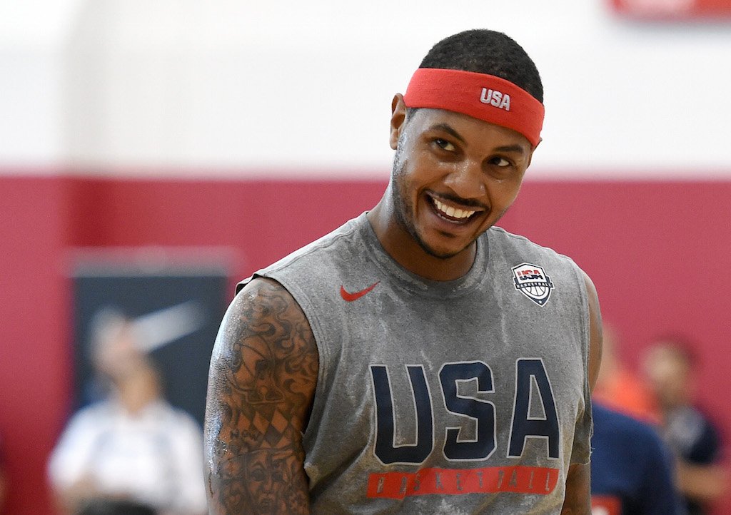 Carmelo Anthony smiles during an Olympic warmup.