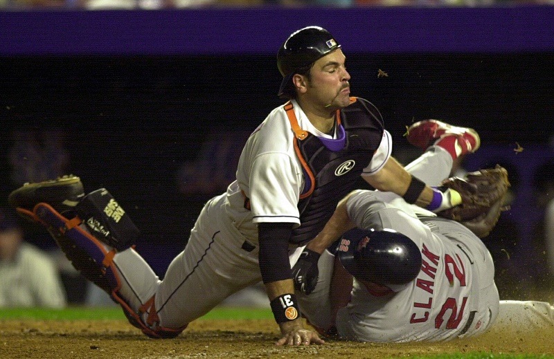 Will Clark was out when he slid into home plate -- and into Mike Piazza
