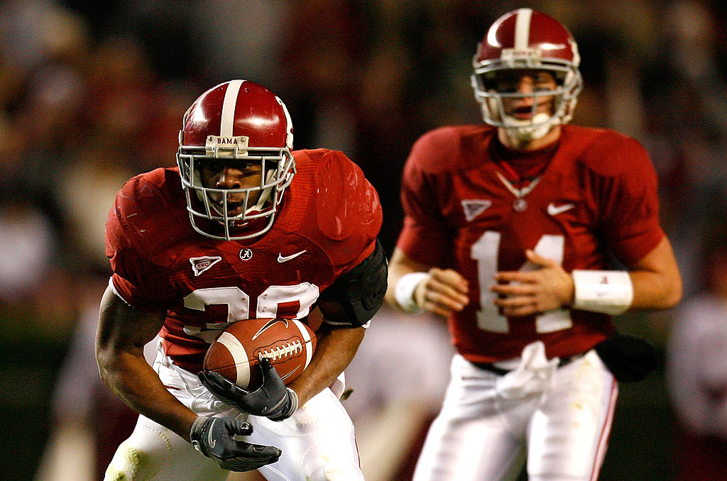 Running back Glen Coffee of the Alabama Crimson Tide rushes upfield.