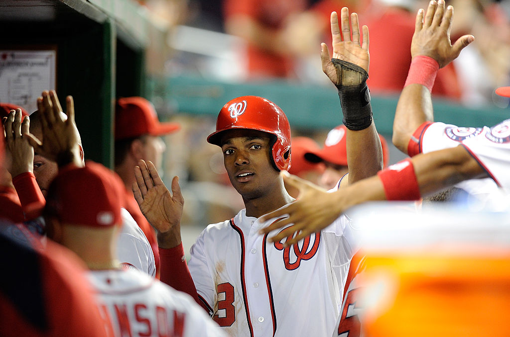 Michael Taylor #3 of the Washington Nationals celebrates with teammates after scoring in the fifth inning against the Baltimore Orioles at Nationals Park on September 23, 2015 in Washington, DC. (Photo by Greg Fiume/Getty Images)