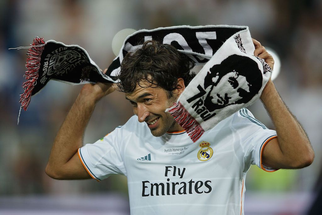 Raul wraps his namesake scarf around his neck.
