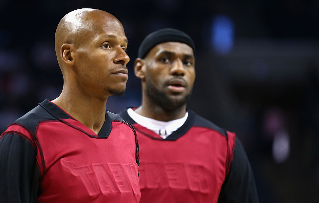 Ray Allen of the Miami Heat and teammate LeBron James warm up before a game.