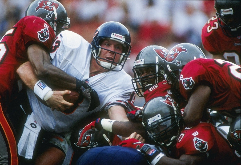 21 Dec 1997: Quarterback Rick Mirer of the Chicago Bears is mobbed by the Tampa Bay Buccaneers defense during the Bears 31-15 loss at Houlihan''s Stadium in Tampa, Florida. Mandatory Credit: Scott Halleran /Allsport