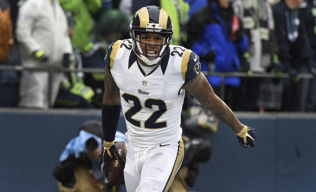 The Los Angeles Rams' Trumaine Johnson celebrates an interception.
