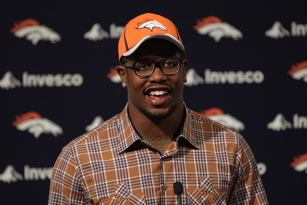 Von Miller smiles during a Denver Broncos press event.