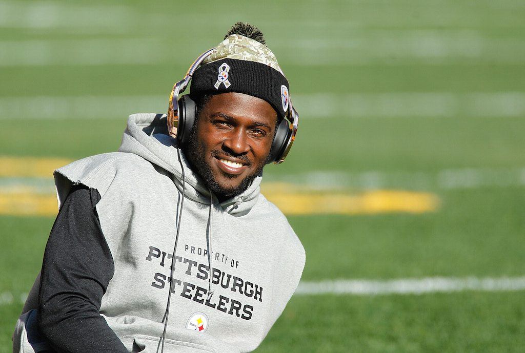 Antonio Brown smiles as he stretches before a game.