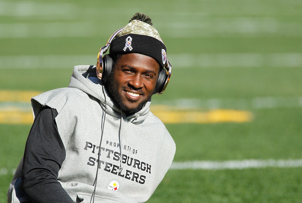 Antonio Brown smiles as he warms up.