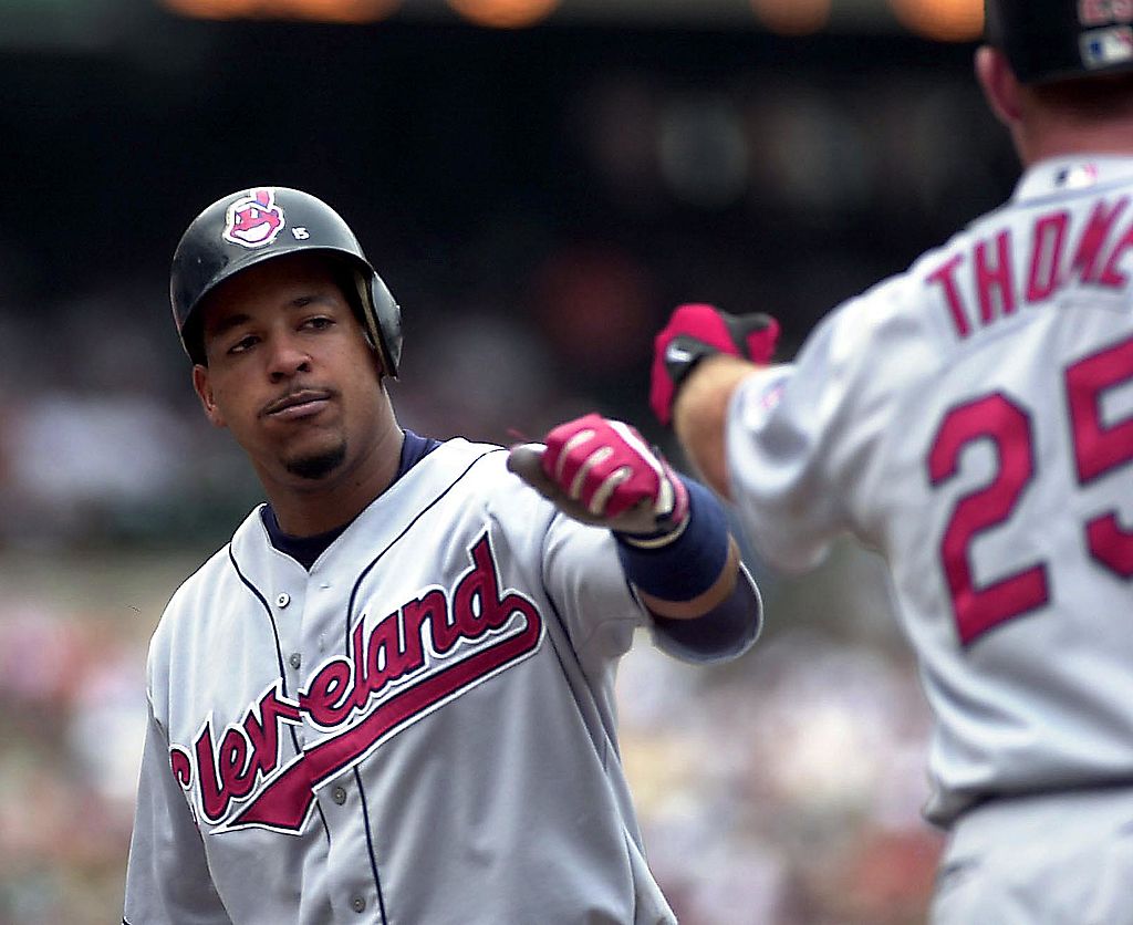 Cleveland Indian batter Manny Ramirez is greeted by teammate Jim Thome after hitting his 12th career grand slam homerun off Baltimore Orioles pitcher Pat Rapp to give the Indians a 5-0 lead in the second inning 29 July 2000 at Camden Yards in Baltimore, MD. Ramirez got two homeruns and six RBIs in the Indians 14-3 victory.