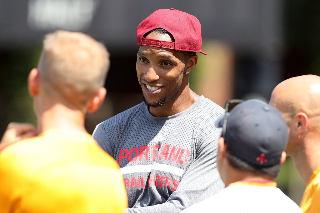 Evan Turner of the Portland Trail Blazers speaks to members of AS Roma during a friendly match against the Boston Bolts.