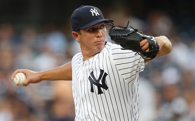 Chad Green of the New York Yankees delivers a pitch against the Toronto Blue Jays.