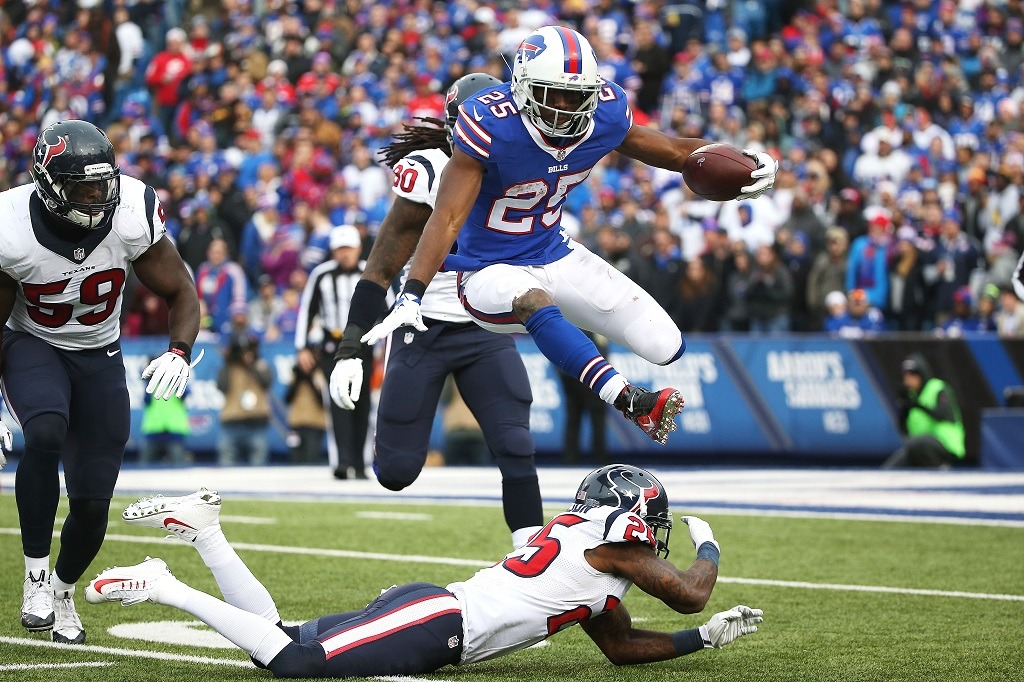 ORCHARD PARK, NY - DECEMBER 06: LeSean McCoy #25 of the Buffalo Bills hurdles Kareem Jackson #25 of the Houston Texans during the second half at Ralph Wilson Stadium on December 6, 2015 in Orchard Park, New York. (Photo by Tom Szczerbowski/Getty Images)