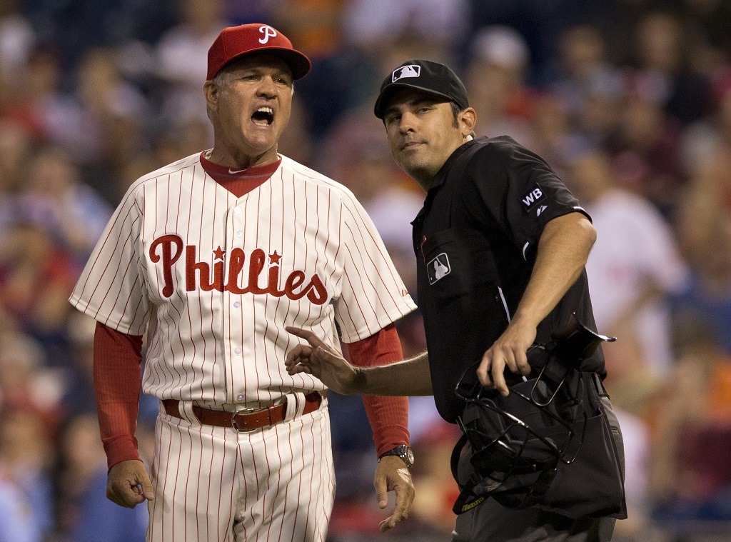 PHILADELPHIA, PA - JUNE 13: Manager Ryne Sandberg #23 of the Philadelphia Phillies is ejected in the top of the sixth inning by home plate umpire Mark Ripperger #90 after Phillies pitcher Roberto Hernandez #27 hit shortstop Starlin Castro #13 of the Chicago Cubs with a pitch on June 13, 2014 at Citizens Bank Park in Philadelphia, Pennsylvania. (Photo by Mitchell Leff/Getty Images)