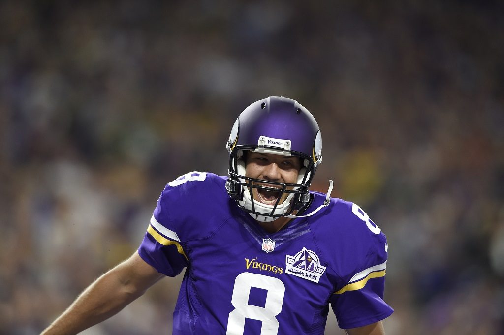 MINNEAPOLIS, MN - SEPTEMBER 18: Quarterback Sam Bradford #8 of the Minnesota Vikings celebrates after completing a touchdown pass in the third quarter of the game against the Green Bay Packers on September 18, 2016 at US Bank Stadium in Minneapolis, Minnesota. The Vikings defeated the Packers 17-14. (Photo by Hannah Foslien/Getty Images)