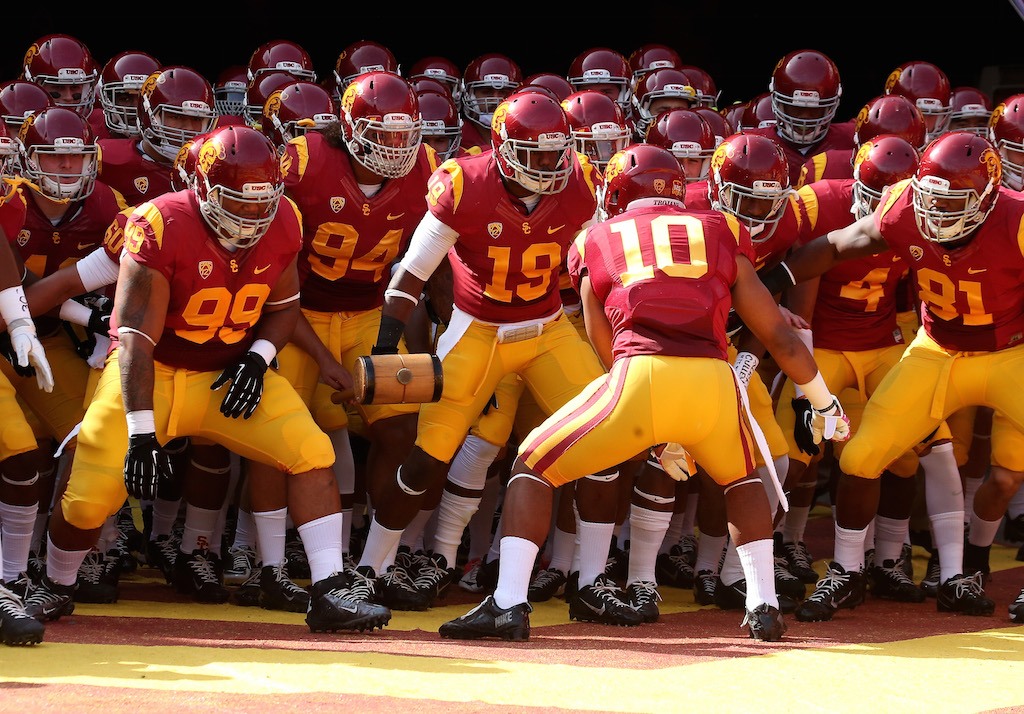 The USC Trojans get pumped up before a game.