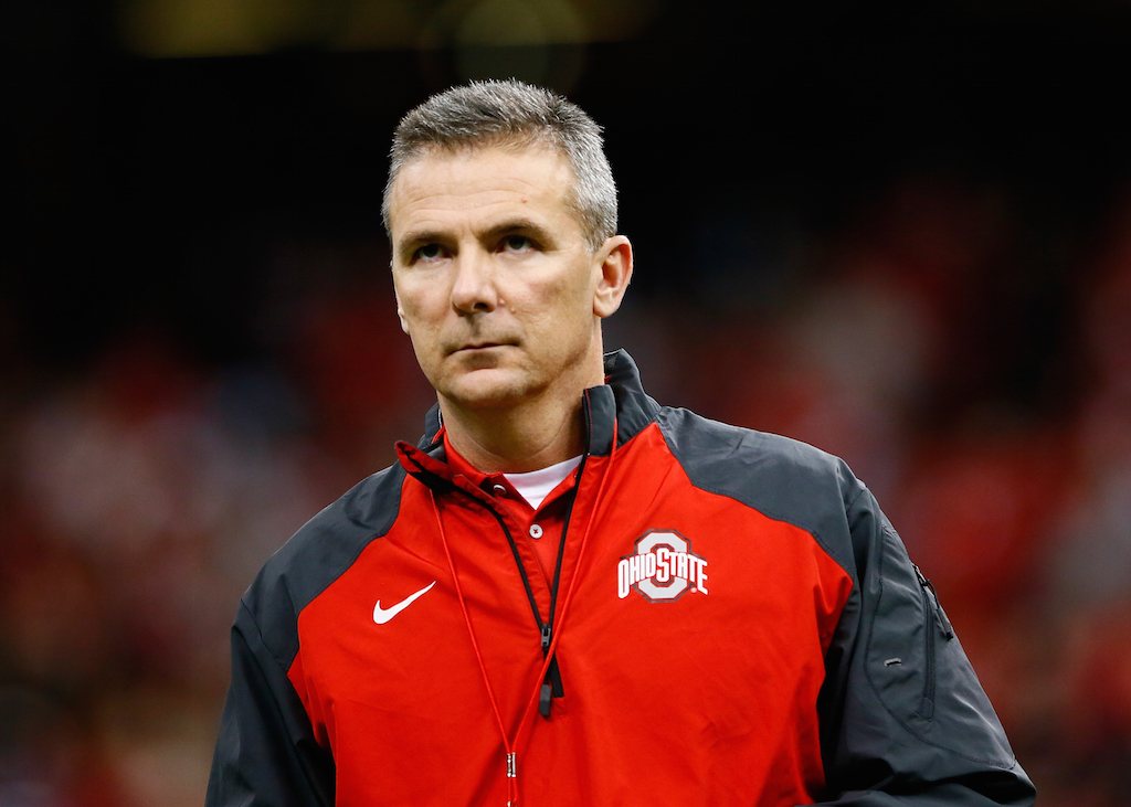 Urban Meyer looks up at the scoreboard.