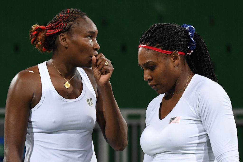 Venus and Serena Williams lose their first-round doubles match at Rio | MARTIN BERNETTI/AFP/Getty Images