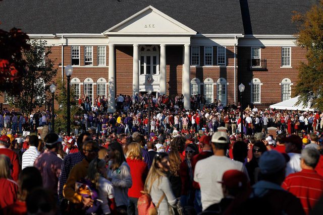 Alabama fans walk around campus before the game.